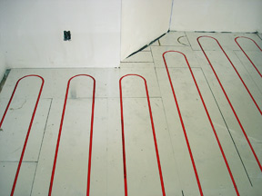 Hydronic floor heating system being installed.